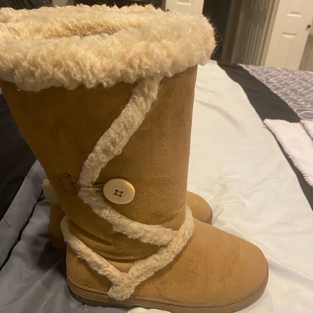 Furry tan boots for those cold weather days.